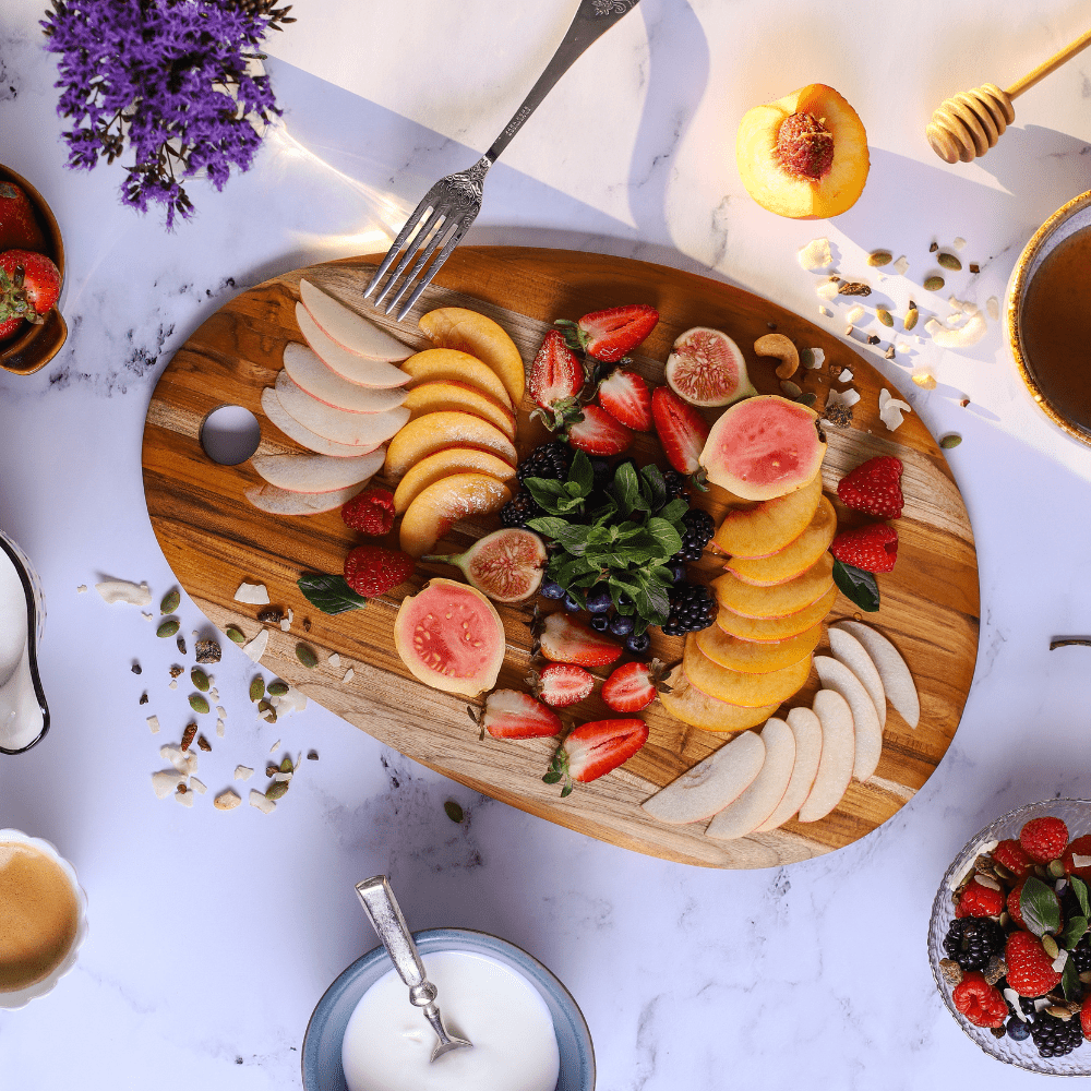 TeakHaus Elegant Oval Board - Medium - Simmer and Slice