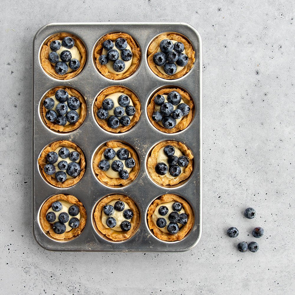 Nordic Ware Naturals 12 Cup Muffin Pan - Simmer and Slice